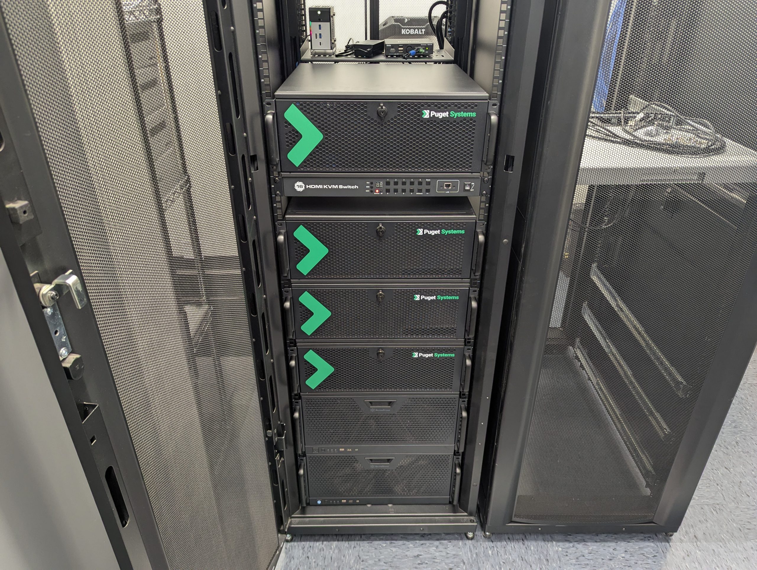 Employee and Puget Bench dev workstations front shot